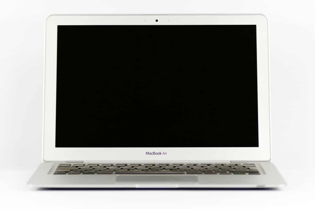 Front view of a MacBook Air laptop with a blank screen on a white background.