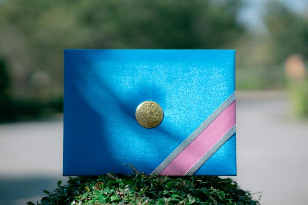 Free stock photo of certificate, college graduation, degree certificate