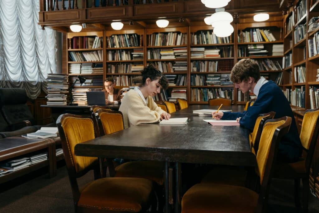 Group of students diligently studying How to Write a Research Paper